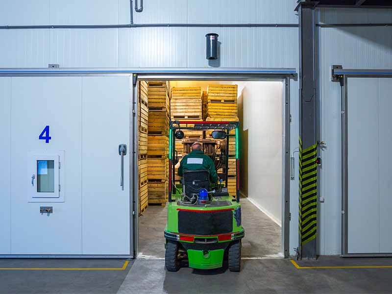 Image of a vehicle entering into a cold storage area.