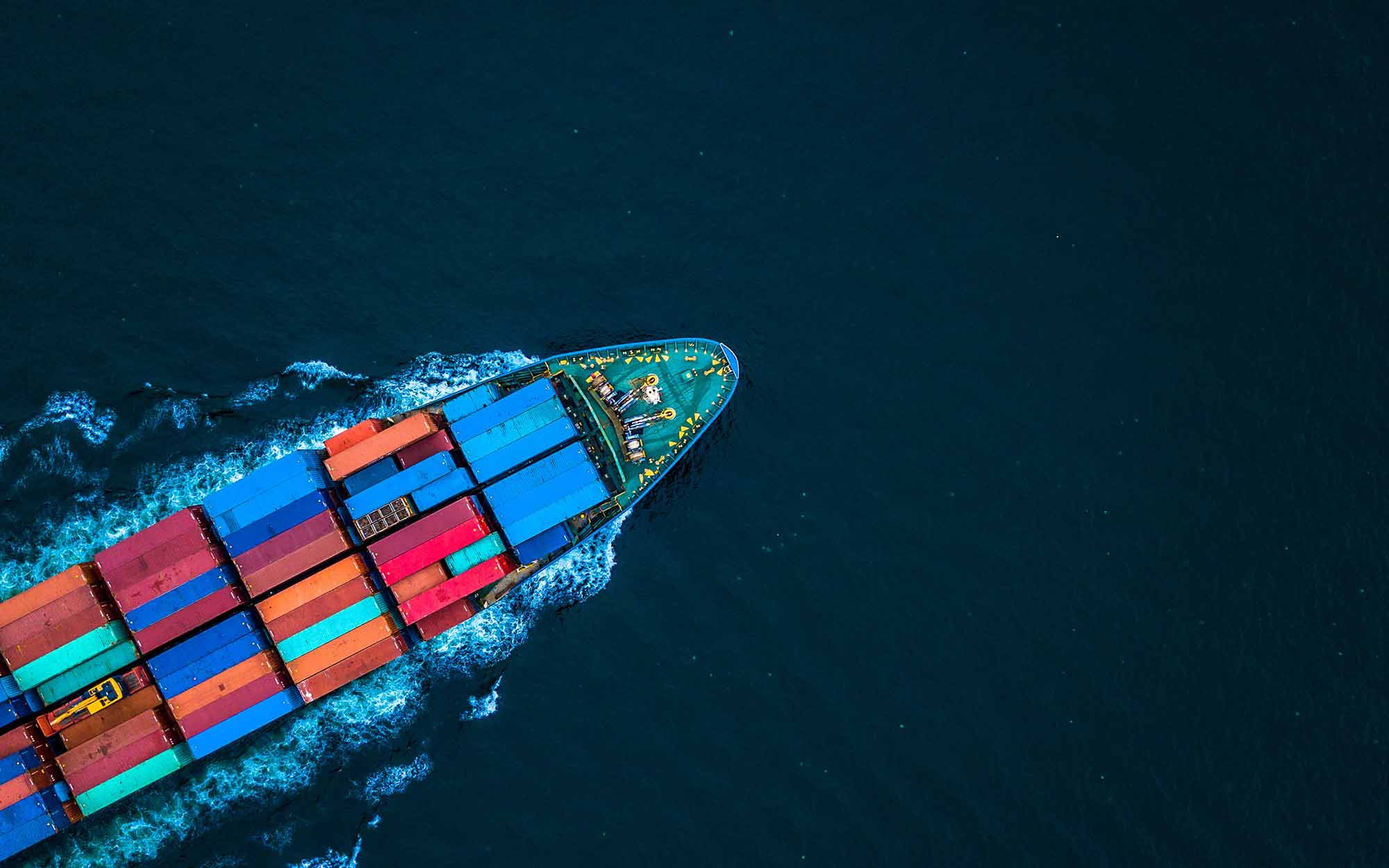 Aerial View From Drone, Container Ship Or Cargo Shipping Business Logistic Import And Export Freight Transportation By Container Ship In Open Sea | FW Logistics